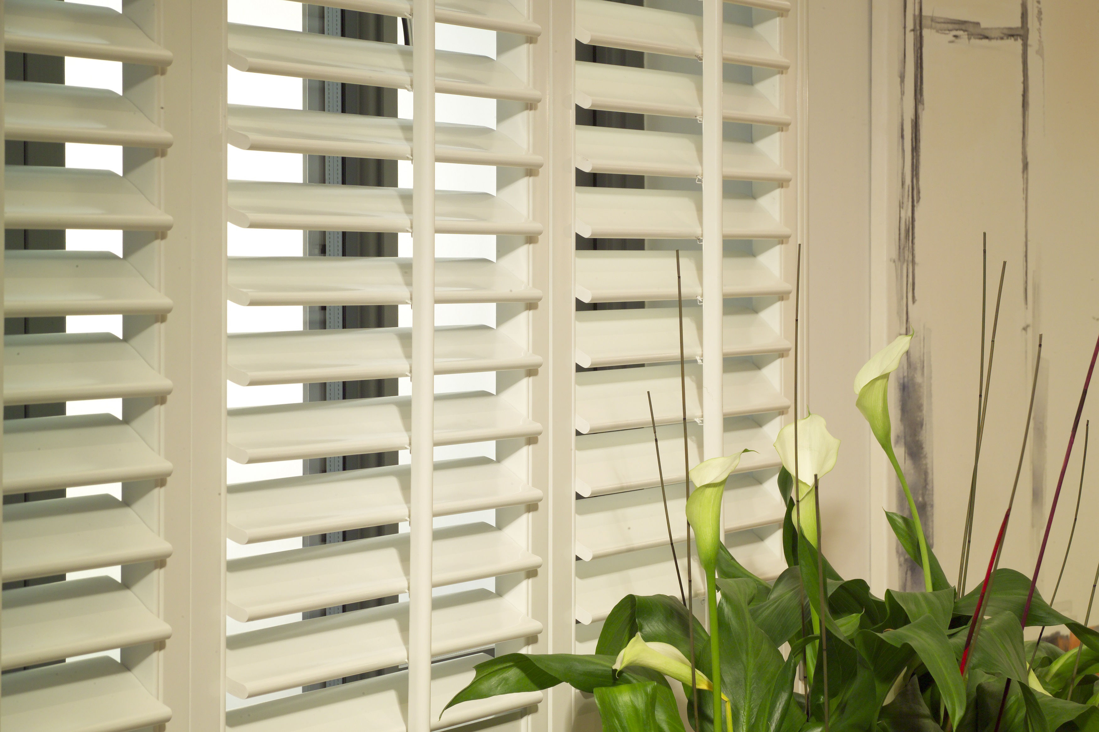 Bright room with cafe style shutters