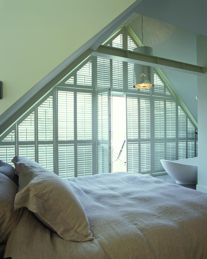 Bright room with cafe style shutters