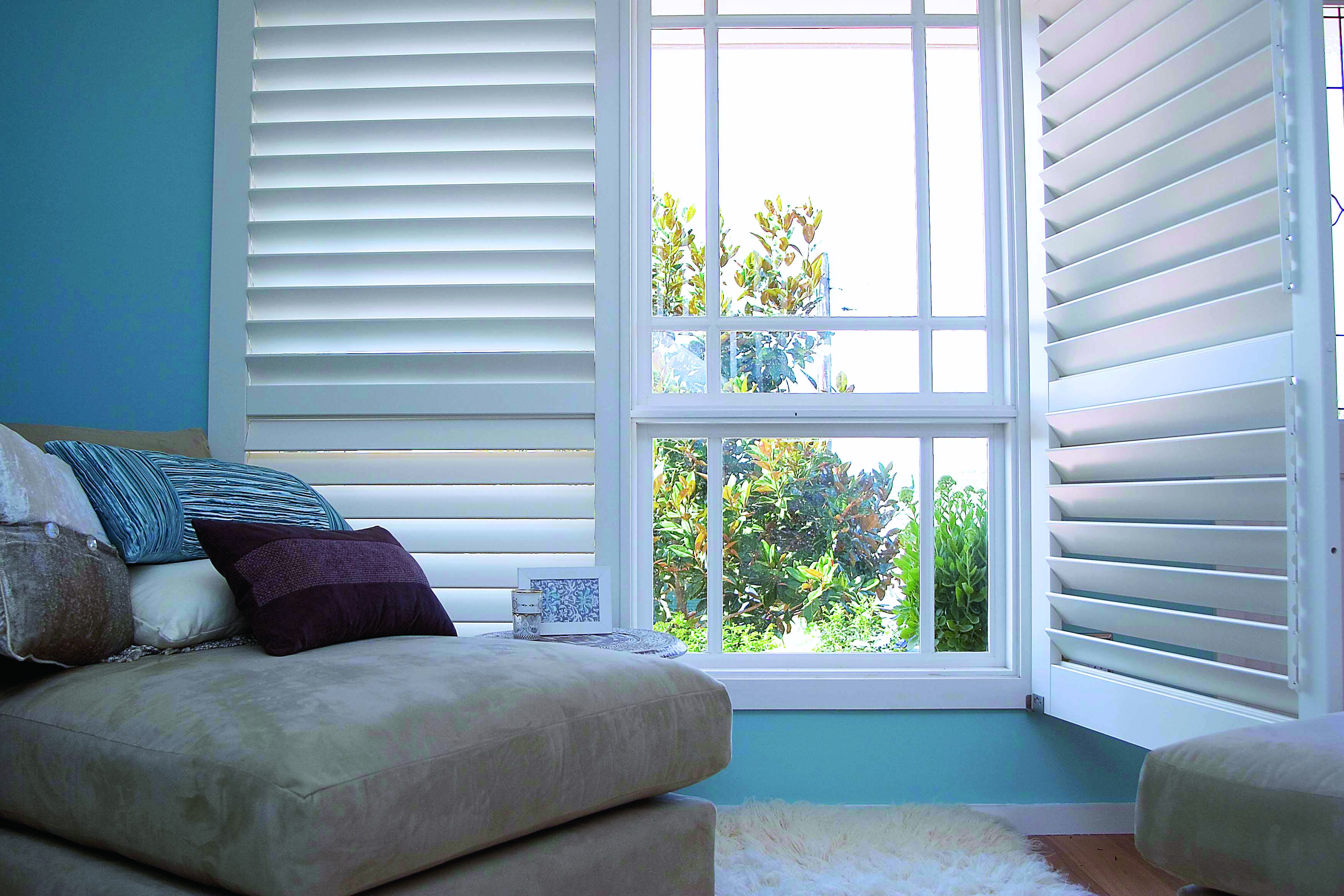 Bright room with cafe style shutters